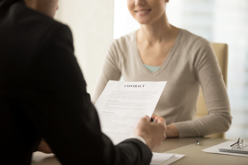 https://www.magnific.com/free-photo/female-male-business-leaders-studying-contract_4013224.htm#from_element=cross_selling__photo Alt text: Contract Staffing Recruiters